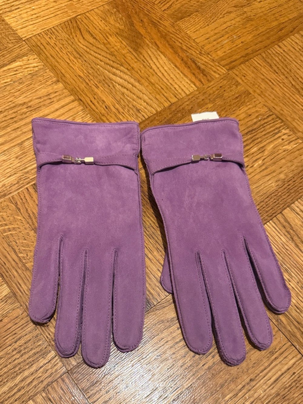 Danier thin wrist strap with small metallic buckle genuine leather gloves